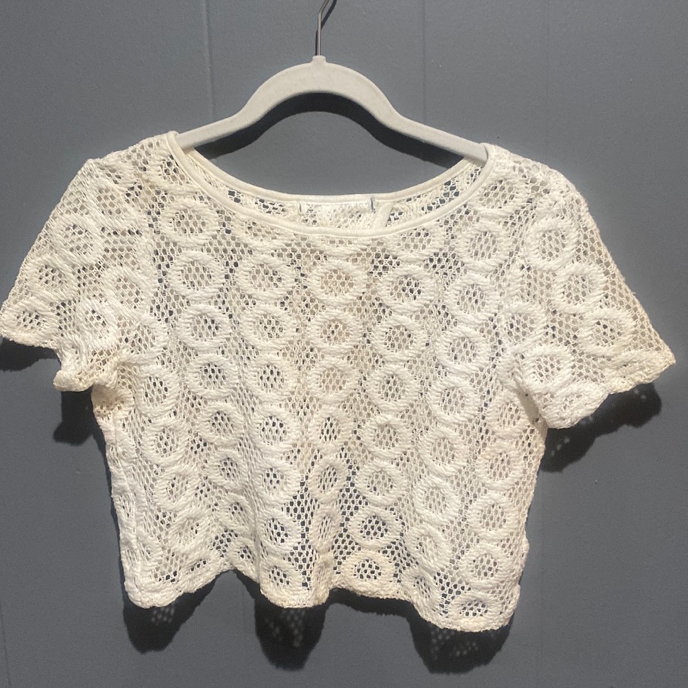 small cream knit top/coverup with open back